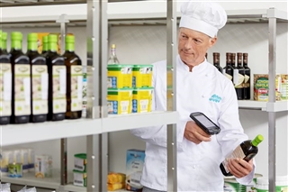 sustainable gastronomy - man cchecking food products sustainable gastronomy - man cchecking food products