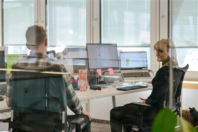 desk sharing - employees at their desk desk sharing - employees at their desk