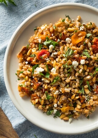 Chilled barley salad with chickpeas, asparagus and cherry tomatoes
